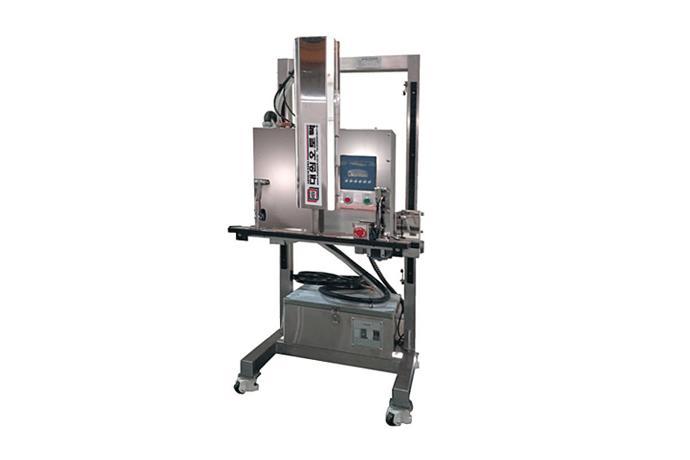 Nozzle Type Vacuum Packaging Machine (Vertical Type)